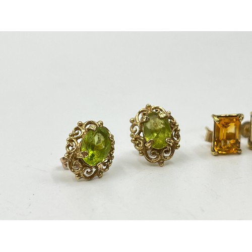 2113 - Three pairs of 9ct gold gemstone stud earrings, two peridot and one citrine - approx. gross weight 4... 