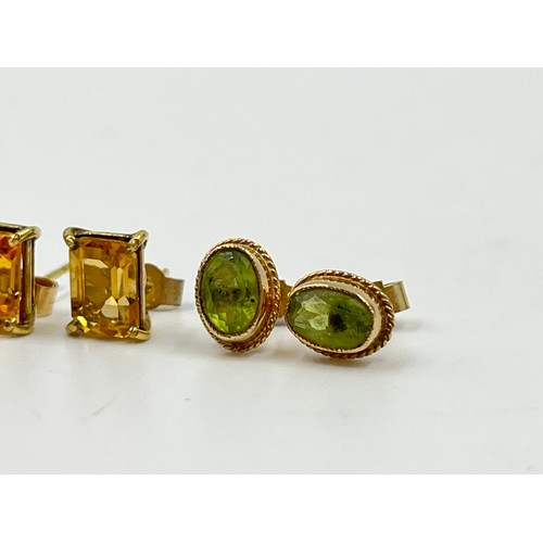 2113 - Three pairs of 9ct gold gemstone stud earrings, two peridot and one citrine - approx. gross weight 4... 