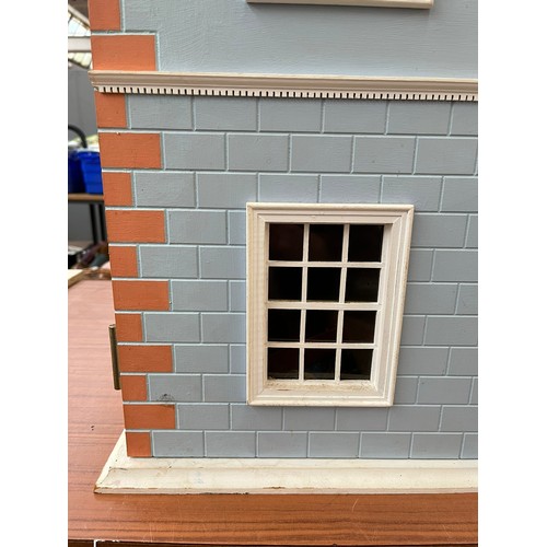 411D - A Georgian style blue painted three storey doll's house with furniture and accessories - approx. 84c... 