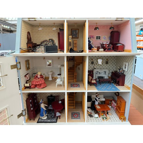 411D - A Georgian style blue painted three storey doll's house with furniture and accessories - approx. 84c... 