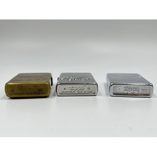 2363 - Three Zippo cigarette lighters