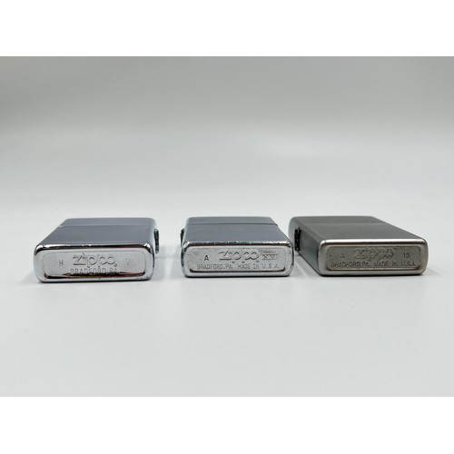 2364 - Three Zippo cigarette lighters