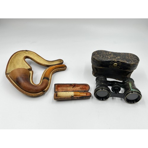 2365 - Three antique leather cased items, Negretti & Zambra Opticians London opera glasses, smoking pipe wi... 