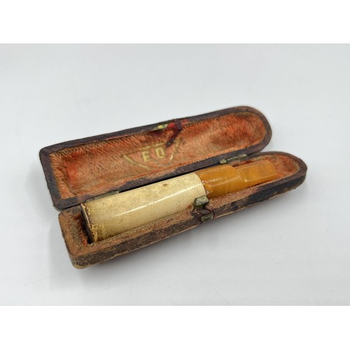 2365 - Three antique leather cased items, Negretti & Zambra Opticians London opera glasses, smoking pipe wi... 