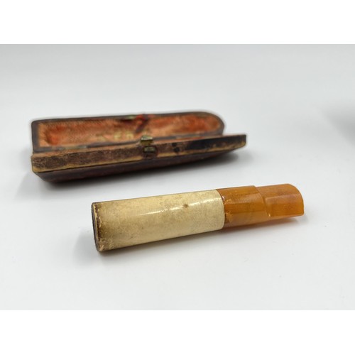 2365 - Three antique leather cased items, Negretti & Zambra Opticians London opera glasses, smoking pipe wi... 