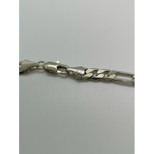 2122A - A stamped 14k Italy curb link bracelet - approx. gross weight 7.39 grams