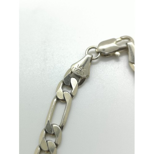 2122A - A stamped 14k Italy curb link bracelet - approx. gross weight 7.39 grams