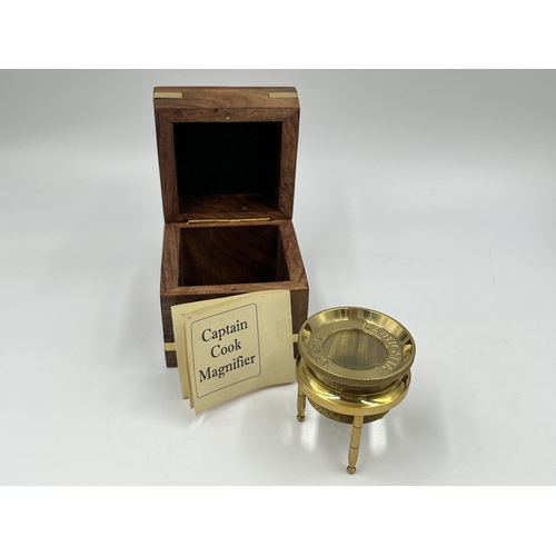 1259 - Three navigational instruments, one wood and brass cased Nauticalia Captain Cook brass focus magnifi... 