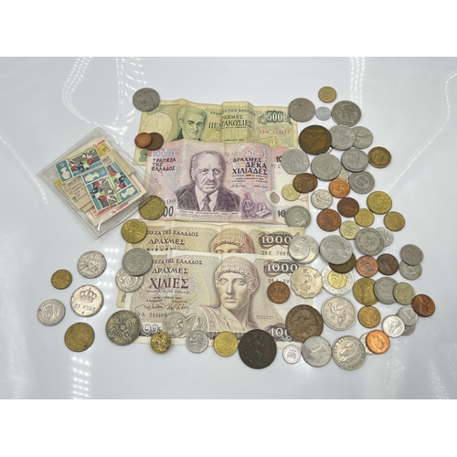 1265 - A collection of worldwide coins and banknotes to include 1920 George V one florin, 10000 Drachmas et... 