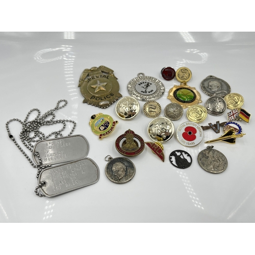 1269 - A collection of badges and buttons to include Royal Pioneer Corps Association, Special Police etc.