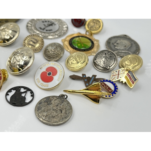 1269 - A collection of badges and buttons to include Royal Pioneer Corps Association, Special Police etc.