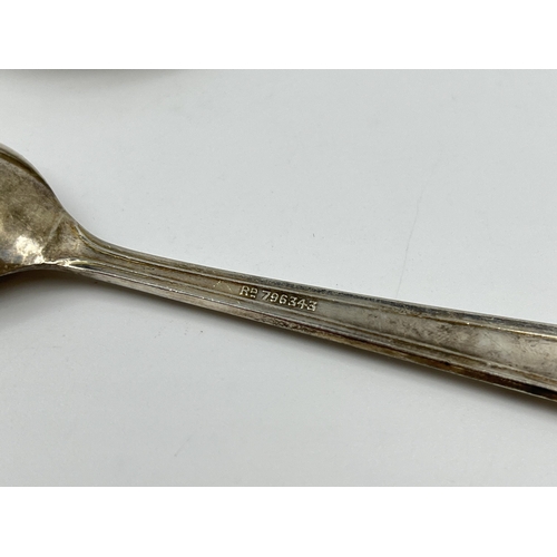 1252 - A cased set of six hallmarked Birmingham silver teaspoons, dated 1942, Rd No. 796343 - approx. gross... 