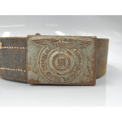 1275 - A WWII leather belt with German SS pressed metal buckle