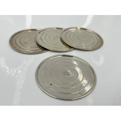 1255 - Four Georg Jensen 193A sterling silver coasters - approx. gross weight 83 grams and 6.5cm diameter