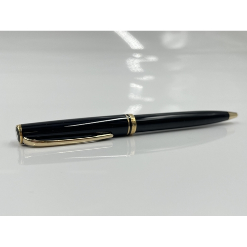 1262 - A boxed Mont Blanc Generation black ballpoint pen with warranty card and service guide - model no. 1... 