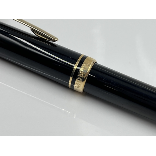 1262 - A boxed Mont Blanc Generation black ballpoint pen with warranty card and service guide - model no. 1... 