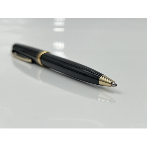 1262 - A boxed Mont Blanc Generation black ballpoint pen with warranty card and service guide - model no. 1... 