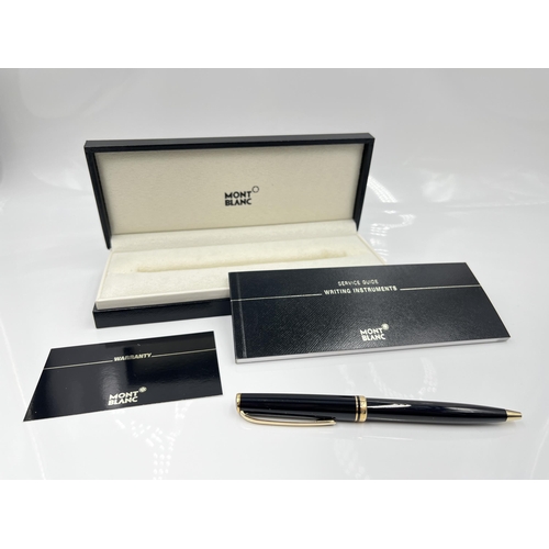 1262 - A boxed Mont Blanc Generation black ballpoint pen with warranty card and service guide - model no. 1... 