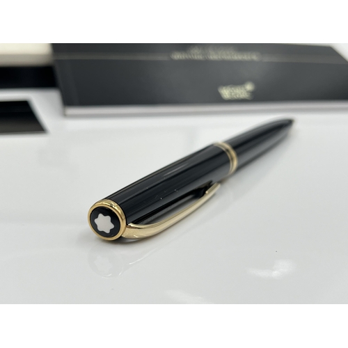 1262 - A boxed Mont Blanc Generation black ballpoint pen with warranty card and service guide - model no. 1... 