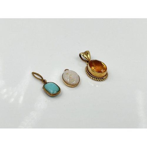 1121 - Three gemstone pendants, one 9ct gold citrine, one yellow metal opal and one yellow metal turquoise ... 