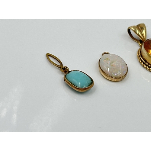 1121 - Three gemstone pendants, one 9ct gold citrine, one yellow metal opal and one yellow metal turquoise ... 