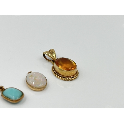 1121 - Three gemstone pendants, one 9ct gold citrine, one yellow metal opal and one yellow metal turquoise ... 