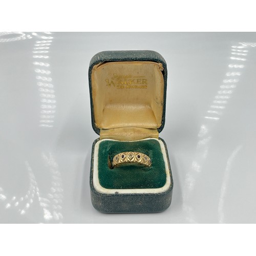 1126 - A hallmarked London 9ct gold garnet and clear gemstone textured eternity ring, dated 1979, size M½ -... 