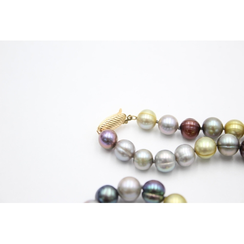 1003 - A multi-coloured pearl necklace with 14ct gold clasp - approx. gross weight 46.6 grams