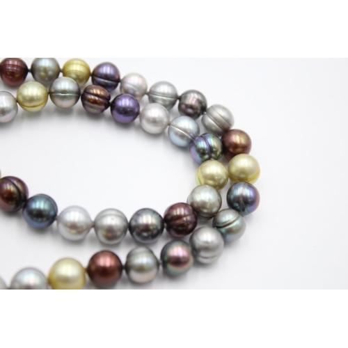 1003 - A multi-coloured pearl necklace with 14ct gold clasp - approx. gross weight 46.6 grams