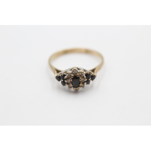 1004 - A 9ct gold sapphire and diamond cluster ring, size S - approx. gross weight 2.4 grams