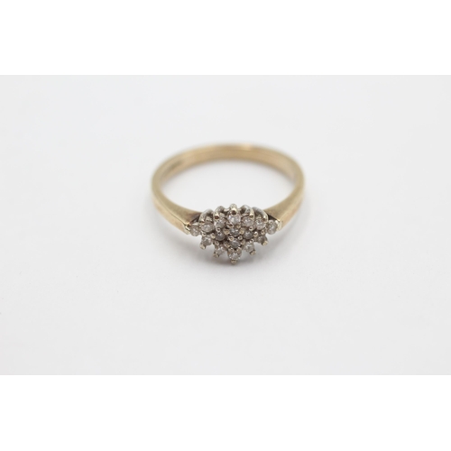 1006 - A 9ct gold diamond cluster ring, size K - approx. gross weight 1.9 grams