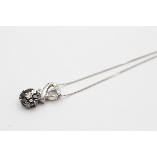 1008 - A 9ct white gold sapphire and diamond pendant necklace - approx. gross weight 1.8 grams