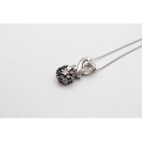 1008 - A 9ct white gold sapphire and diamond pendant necklace - approx. gross weight 1.8 grams