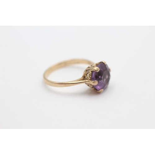 1009 - A 9ct gold amethyst ring, size O - approx. gross weight 2.6 grams