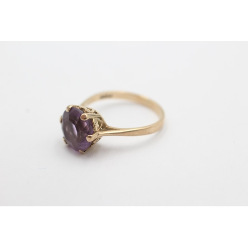 1009 - A 9ct gold amethyst ring, size O - approx. gross weight 2.6 grams