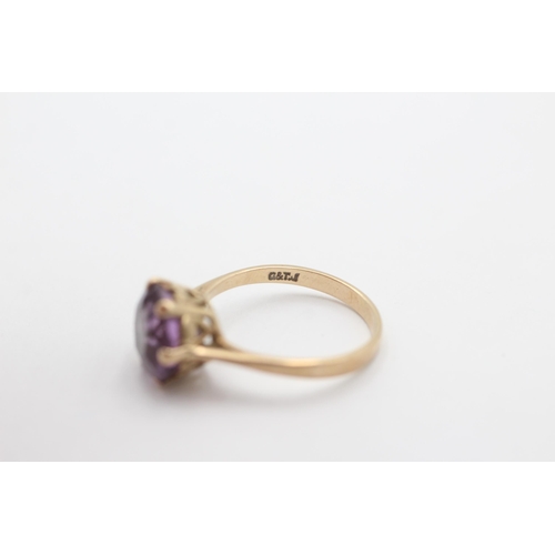 1009 - A 9ct gold amethyst ring, size O - approx. gross weight 2.6 grams