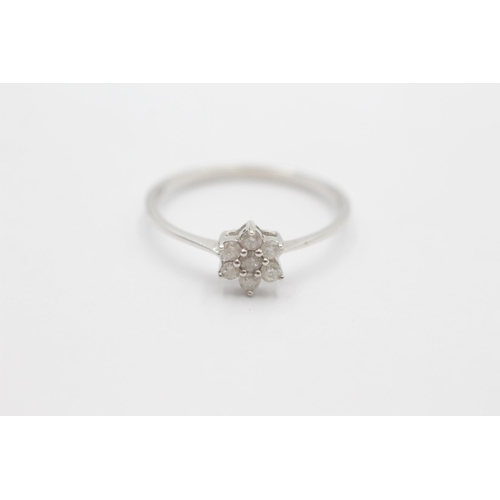 1015 - A 9ct white gold diamond cluster ring, size R½ - approx. gross weight 1.5 grams