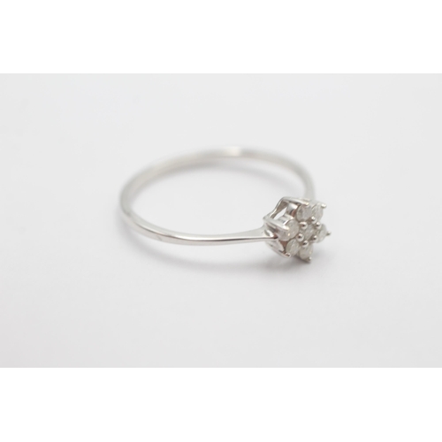 1015 - A 9ct white gold diamond cluster ring, size R½ - approx. gross weight 1.5 grams