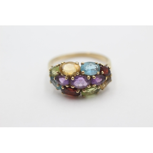 1016 - A 9ct gold garnet, amethyst, citrine, peridot and topaz cluster ring, size P½ - approx. gross weight... 