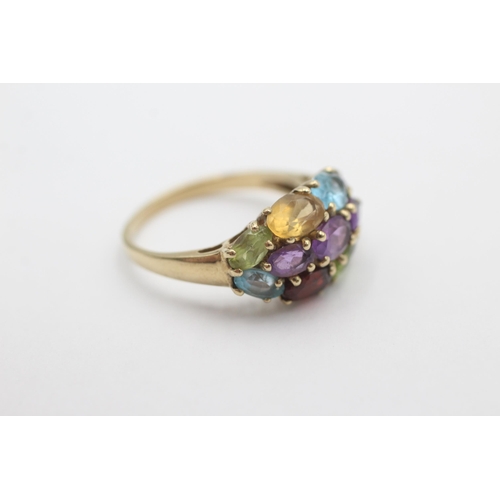 1016 - A 9ct gold garnet, amethyst, citrine, peridot and topaz cluster ring, size P½ - approx. gross weight... 