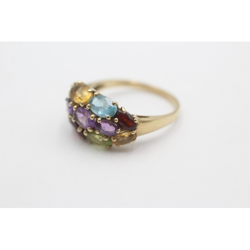 1016 - A 9ct gold garnet, amethyst, citrine, peridot and topaz cluster ring, size P½ - approx. gross weight... 