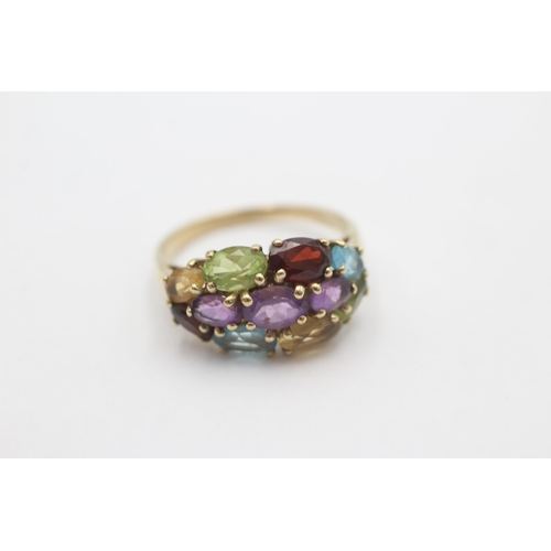 1016 - A 9ct gold garnet, amethyst, citrine, peridot and topaz cluster ring, size P½ - approx. gross weight... 