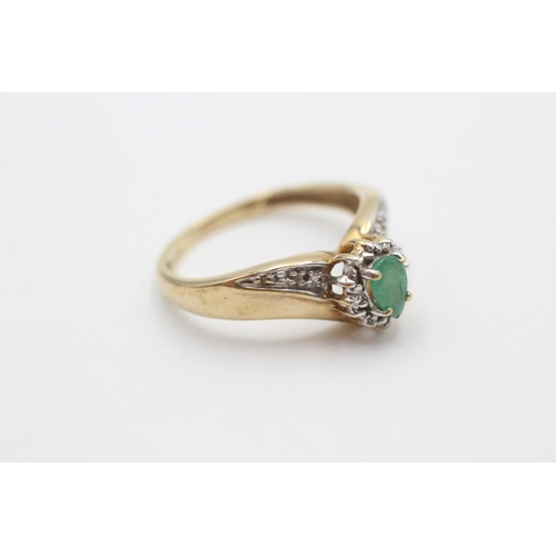 1017 - A 9ct gold emerald and diamond dress ring, size S - approx. gross weight 3.6 grams