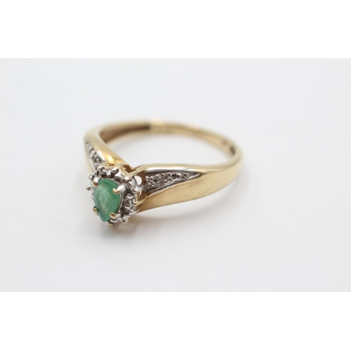 1017 - A 9ct gold emerald and diamond dress ring, size S - approx. gross weight 3.6 grams