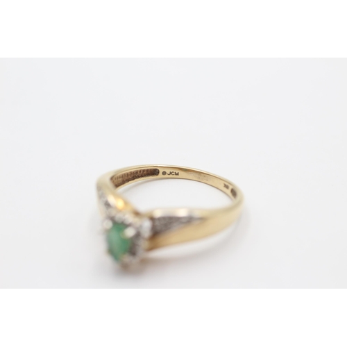 1017 - A 9ct gold emerald and diamond dress ring, size S - approx. gross weight 3.6 grams