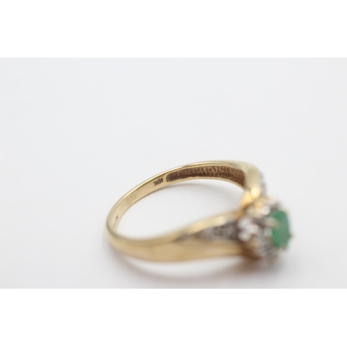 1017 - A 9ct gold emerald and diamond dress ring, size S - approx. gross weight 3.6 grams