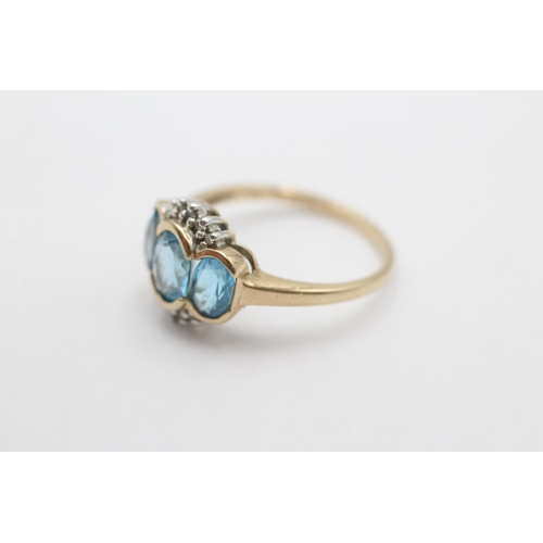 1024 - A 9ct gold diamond and topaz dress ring, size O½ - approx. gross weight 2.5 grams