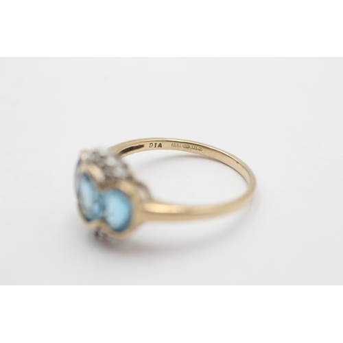 1024 - A 9ct gold diamond and topaz dress ring, size O½ - approx. gross weight 2.5 grams