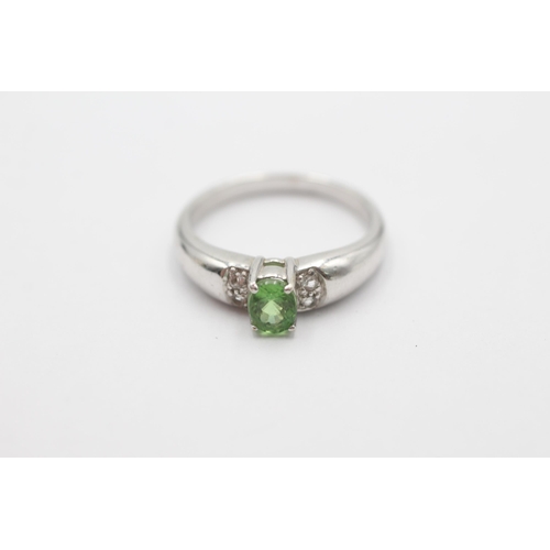 1026 - A 9ct white gold tsavorite garnet and diamond ring, size N½ - approx. gross weight 3 grams