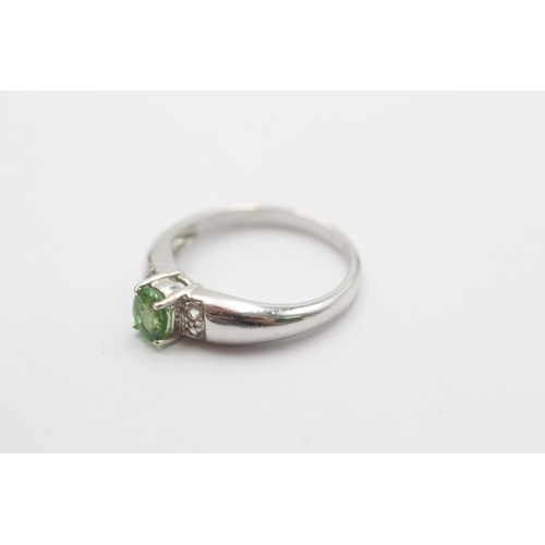 1026 - A 9ct white gold tsavorite garnet and diamond ring, size N½ - approx. gross weight 3 grams